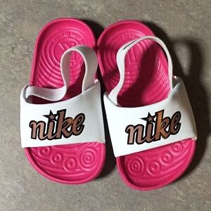Nike Pink and White Slip-On Sandals with Textured Sole